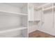 Walk-in closet with storage shelves and hanging rods at 6803 E Main St # 3306, Scottsdale, AZ 85251