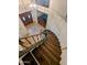 Beautiful foyer view from above with spiral stairs, decorative tile and a glimpse of the billiards room at 6901 W Marco Polo Rd, Glendale, AZ 85308