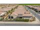 Beautiful home showcasing a tile roof, covered patio, desert landscaping, and a neatly fenced yard at 706 E La Palta St, Queen Creek, AZ 85140