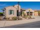 Charming single-Gathering home featuring a two-car garage, stucco exterior, and desert landscaping at 706 E La Palta St, Queen Creek, AZ 85140