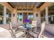 Charming outdoor patio with pergola, dining area, and inviting ambiance at 706 E La Palta St, Queen Creek, AZ 85140