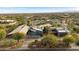 Aerial view of luxury property with desert landscaping and mountain views at 8845 E Sierra Pinta Dr, Scottsdale, AZ 85255