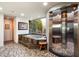 The bathroom features unique flooring, a built-in bathtub, and a stainless steel shower at 8845 E Sierra Pinta Dr, Scottsdale, AZ 85255