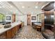 This bathroom features unique flooring, dual vanities, and a stainless steel shower at 8845 E Sierra Pinta Dr, Scottsdale, AZ 85255