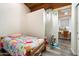 Cozy bedroom with a desk and a bright window for natural light at 8845 E Sierra Pinta Dr, Scottsdale, AZ 85255