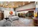 Spacious bedroom with an elegant ceiling fan, wood ceiling and backyard view at 8845 E Sierra Pinta Dr, Scottsdale, AZ 85255
