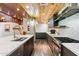 Gourmet kitchen with sleek cabinetry, an oversized island, and stainless steel appliances at 8845 E Sierra Pinta Dr, Scottsdale, AZ 85255
