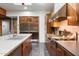 Well-equipped kitchen with stainless steel appliances, gas range, and ample cabinet space at 8845 E Sierra Pinta Dr, Scottsdale, AZ 85255