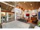 Large living area with a high, wood-clad ceiling, a modern railing, and sleek marble floors at 8845 E Sierra Pinta Dr, Scottsdale, AZ 85255