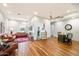 Spacious living room with hardwood floors, ample natural light, and comfortable seating area at 8845 E Sierra Pinta Dr, Scottsdale, AZ 85255