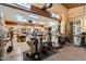 An oversized workshop with overhead lighting and plenty of space to work on projects at 8845 E Sierra Pinta Dr, Scottsdale, AZ 85255