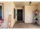 View of a cozy front porch with tile flooring, plants, and outdoor furniture at 950 W Cooley Dr, Gilbert, AZ 85233