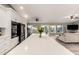 Spacious kitchen flows into the living space with hardwood floors at 950 W Cooley Dr, Gilbert, AZ 85233