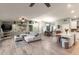 Large open space including living room, dining room and kitchen area at 950 W Cooley Dr, Gilbert, AZ 85233