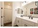 A bright bathroom with double sinks, modern fixtures, and ample lighting, perfect for a refreshing start to the day at 9960 E Strobe Ave, Mesa, AZ 85212