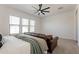 Comfortable bedroom with neutral color tones and a view of the bedroom sitting area at 9960 E Strobe Ave, Mesa, AZ 85212