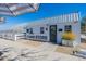 Charming farm store with a white exterior, showcasing fresh produce and locally sourced goods for a community-focused lifestyle at 9960 E Strobe Ave, Mesa, AZ 85212