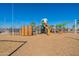 Modern playground with slides, climbing walls, and shaded areas, designed for enjoyment and physical development at 9960 E Strobe Ave, Mesa, AZ 85212