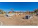 Extensive playground featuring swings, slides, and climbing structures, fostering active play and community interaction at 9960 E Strobe Ave, Mesa, AZ 85212