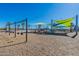 Colorful playground with shade structures and diverse play equipment, promoting outdoor fun and healthy activities for families at 9960 E Strobe Ave, Mesa, AZ 85212