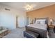 Bedroom with warm neutral tones and ensuite bathroom access for comfortable living at 10368 E Gold Nugget Ct, Gold Canyon, AZ 85118