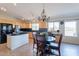 Well-lit kitchen blends into the dining space, featuring modern appliances at 10368 E Gold Nugget Ct, Gold Canyon, AZ 85118