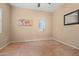 Bright, airy bedroom with large windows, neutral walls, and plush carpeting at 10421 W Via Del Sol -- # 379, Peoria, AZ 85383