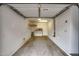 Spacious garage interior with ample storage space, featuring a workbench and plenty of room for tools and equipment at 10421 W Via Del Sol -- # 379, Peoria, AZ 85383