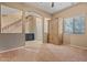 Spacious living room featuring an open floor plan with carpet and neutral paint at 10421 W Via Del Sol -- # 379, Peoria, AZ 85383