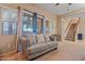 Comfortable living room with plush sofas, a view of the patio, and a staircase at 10421 W Via Del Sol -- # 379, Peoria, AZ 85383