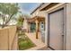 Brick patio with pergola, stone accents, and outdoor access at 10421 W Via Del Sol -- # 379, Peoria, AZ 85383