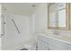 Bathroom features walk-in shower, gray vanity, and updated fixtures at 12221 W Bell Rd # 119, Surprise, AZ 85378