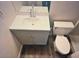Bathroom includes a vanity with modern fixtures and toilet at 12221 W Bell Rd # 119, Surprise, AZ 85378