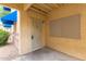 Neutral apartment front door with a security screen, and exterior mail drop at 12221 W Bell Rd # 119, Surprise, AZ 85378