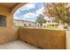 Cozy patio space with a view of well-maintained community landscape and seating areas at 12221 W Bell Rd # 119, Surprise, AZ 85378