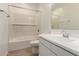 Clean bathroom with a shower-tub combo and a well-lit vanity at 12361 W Marguerite Ave, Avondale, AZ 85323