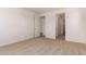 A spacious bedroom with plush carpet flooring and bright white walls at 12361 W Marguerite Ave, Avondale, AZ 85323