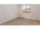 Bedroom flooded with natural light, creating a serene atmosphere at 12361 W Marguerite Ave, Avondale, AZ 85323