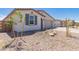 Single-story home featuring low-maintenance landscaping and a neutral color palette at 12361 W Marguerite Ave, Avondale, AZ 85323