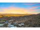 Expansive aerial view showcasing desert home nestled in the mountains with city views beyond at 14725 N Mariposa Ct, Fountain Hills, AZ 85268