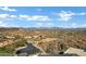 Stunning aerial view of a desert landscape with luxury homes nestled in the hills at 14725 N Mariposa Ct, Fountain Hills, AZ 85268