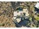 Aerial view showcases the desert home's unique roofline and surrounding landscape at 14725 N Mariposa Ct, Fountain Hills, AZ 85268