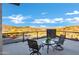 Balcony with desert views, seating, and a glass railing at 14725 N Mariposa Ct, Fountain Hills, AZ 85268