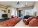 A large bedroom features a sliding glass door, a private balcony, neutral walls, and hardwood floors at 14725 N Mariposa Ct, Fountain Hills, AZ 85268