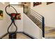 Home foyer featuring artwork, a staircase, and beautiful tile flooring at 14725 N Mariposa Ct, Fountain Hills, AZ 85268