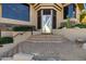 Exterior view of the home's front entrance with desert landscaping and brick steps at 14725 N Mariposa Ct, Fountain Hills, AZ 85268