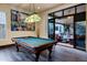 Game room with a pool table, hardwood floors, and sliding glass doors at 14725 N Mariposa Ct, Fountain Hills, AZ 85268