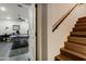 A game room featuring a table tennis table, ceiling fan, and staircase at 14725 N Mariposa Ct, Fountain Hills, AZ 85268