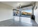 Spacious garage featuring epoxy flooring, high ceilings, and oversized glass door at 14725 N Mariposa Ct, Fountain Hills, AZ 85268