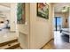 Neutral hallway leads to a bedroom with large sliding glass doors and beautiful views at 14725 N Mariposa Ct, Fountain Hills, AZ 85268